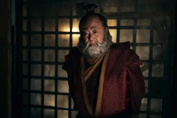 Paul Sun-Hyung Lee as Iroh in season 1 of Avatar: The Last Airbender wearing red and gold robes