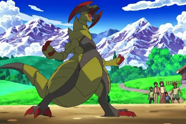 Haxorus screaming as a group of people watch on