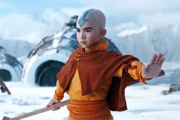 Kiawentiio as Katara, Gordon Cormier as Aang, Ian Ousley as Sokka in Avatar: The Last Airbender standing in a circle ready for battle