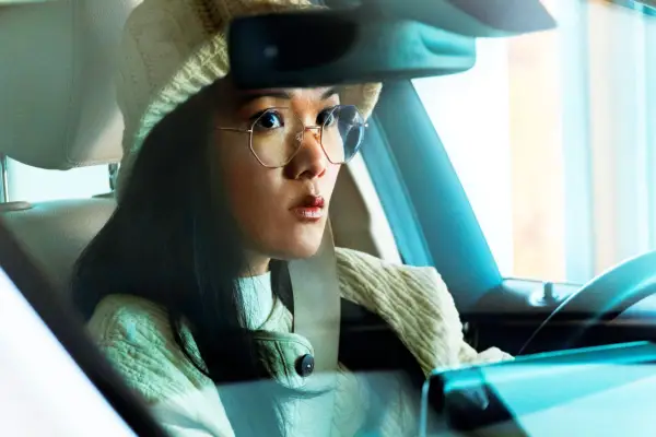 Amy sat in her car with a concerned expression on her face