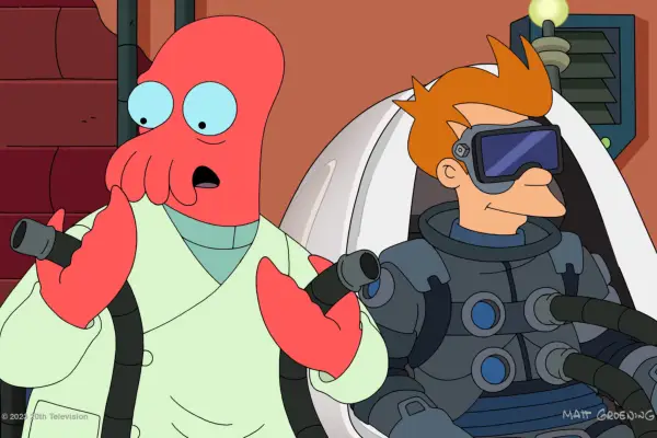 Fry and Zoidberg in the Futurama reboot, with Fry wearing a suit with tubes plugged into it