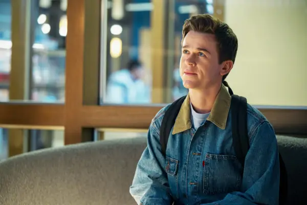 Jackson sitting on a coach with his head held high