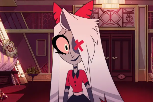 Vaggie in Hazbin Hotel with a cross on one eye, looking into camera