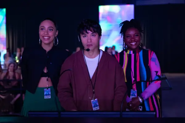 Emma Ferreira as Ness and Jordan Mendoza as Felix in Neon stood next to each other, smiling