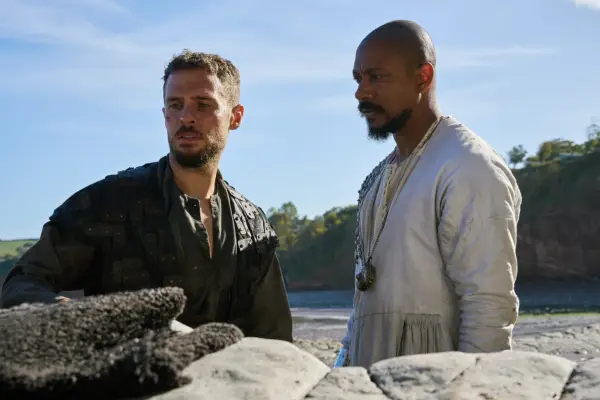 Iain De Caestecker as Arthur and Nathaniel Martello-White as Merlin in The Winter King