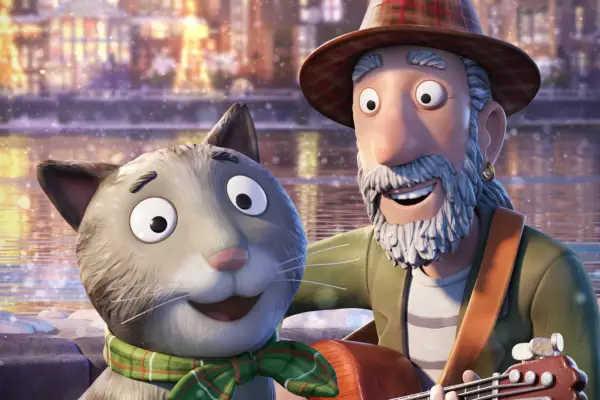 An animated cat and busker smile in front of the London skyline.