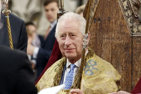 A first look at King Charles III in Charles III: The Coronation Year, with the King on a throne