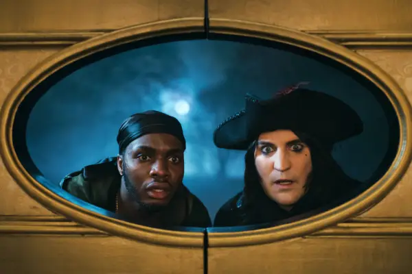 Dick Turpin peering through a circular window