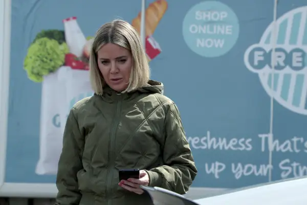 Abi looking conflicted in Coronation Street