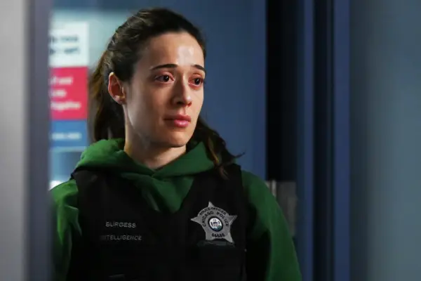 Marina Squerciati as Kim Burgess in Chicago PD wearing her uniform, with a sad expression on her face