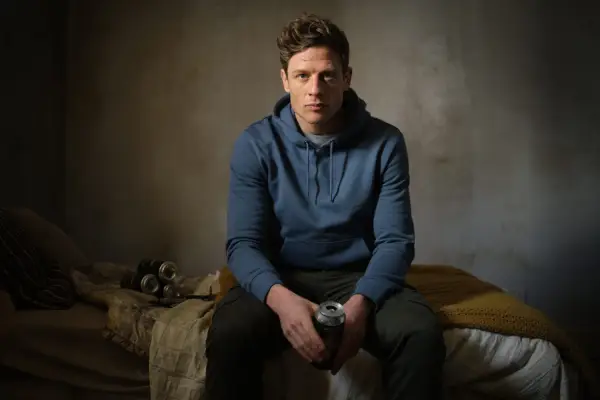 James Norton as Tommy Lee Royce in Happy Valley sitting in a hoodie