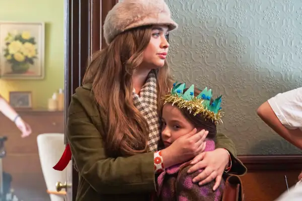 Nancy and Colette sharing a hug