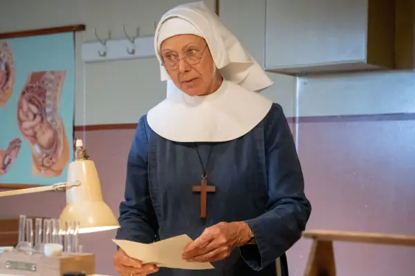 Sister Julienne in the maternity ward wearing her uniform. She