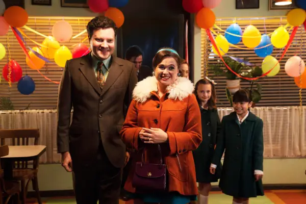 Roger Noble (CONOR O’DONNELL) and Nancy Corrigan (MEGAN CUSACK) walking into their engagement party