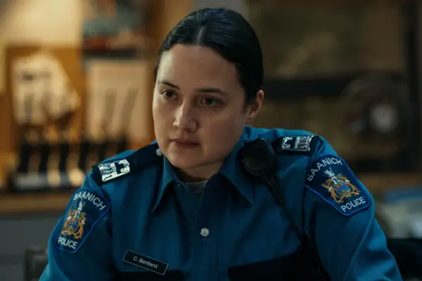 Riley Keough as Rebecca and Lily Gladstone as Cam on the poster for Under the Bridge, stood next to each other