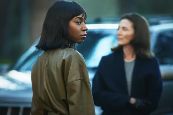 Shannon with her back turned looking over her shoulder