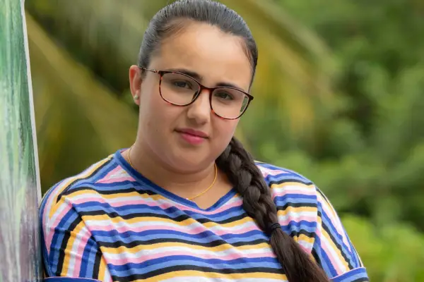 Close-up of Leila Khan as Riley