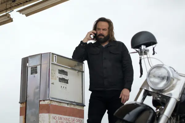 Angus Sampson as Cisco in The Lincoln Lawyer, speaking on the phone
