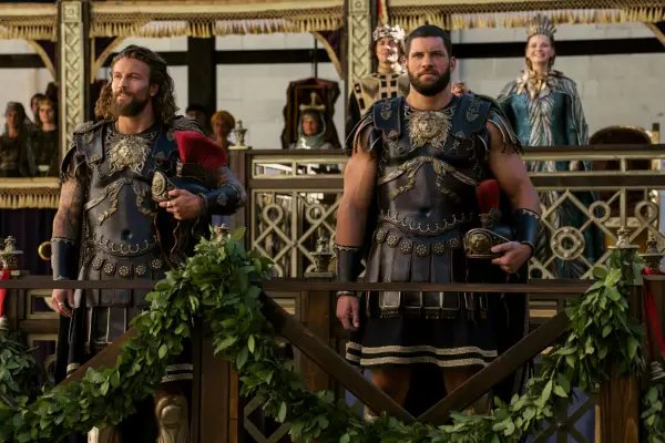 Harald and General Maniakes standing on a leafy, lavish balcony