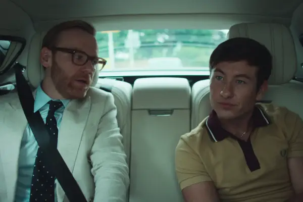 Brian Gleeson as Jonny and Barry Keoghan as Tadgh sitting in a car in Top Boy.