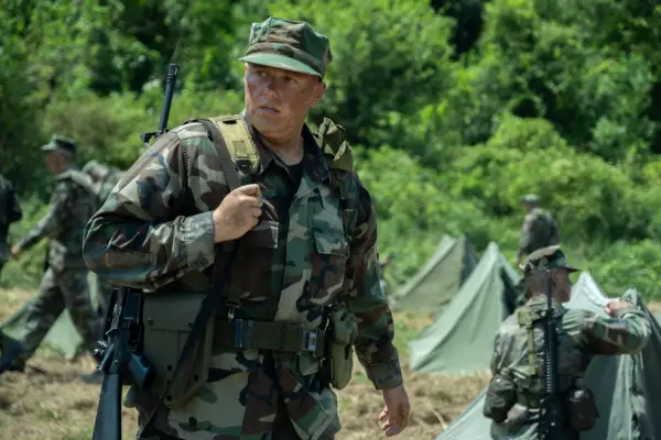 Blake Burt as John Bowman in Boots