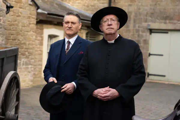 Tom Chambers as Chief Inspector Sullivan and Mark Williams as Father Brown in Father Brown