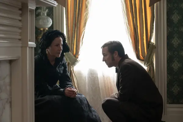 Sharon Horgan, Anne-Marie Duff, Eva Birthistle, Sarah Greene and Eve Hewson sitting at a table outdoors surrounded by wine glasses.