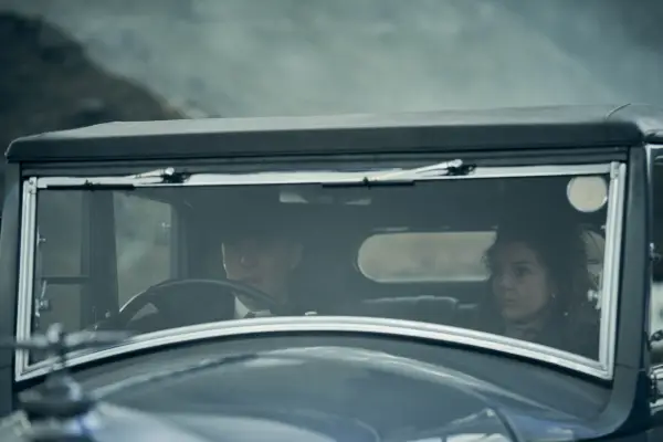 Tommy Shelby and Esme Shelby-Lee in a car in Peaky Blinders