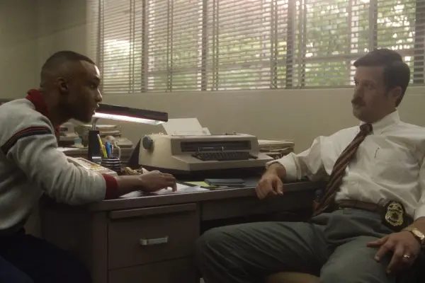 Dyllón Burnside as Ronald Flowers and Matt Cordova as Detective Rauss in DAHMER