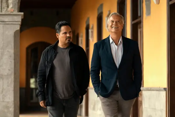 Michael Peña in Jack Ryan season 4, walking alongside another man