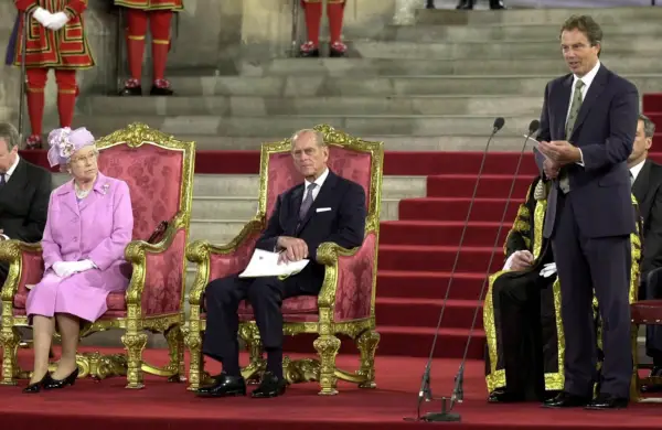 British Queen Elizabeth II and the Duke of Edinburgh listen to Britain