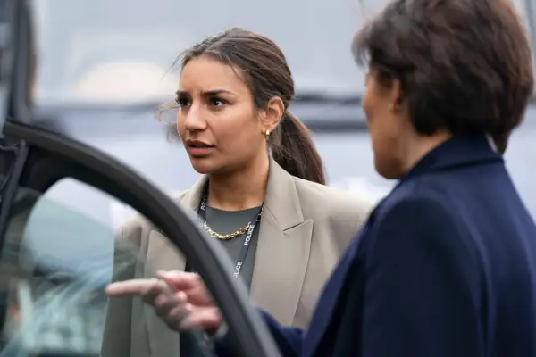 Siobhan getting out of a car