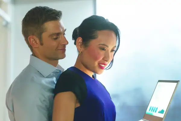 Cooper stood behind Francesca. She