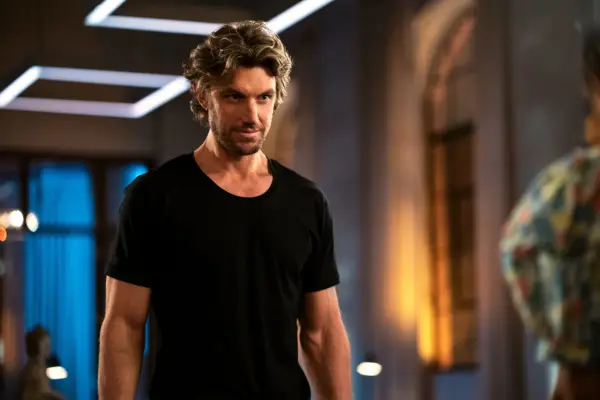 Brad standing in his apartment