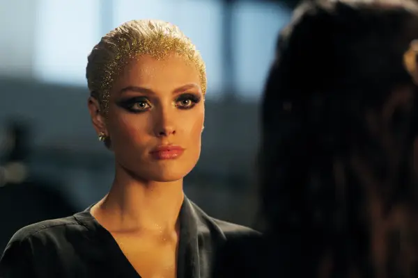 Gigi having a tense conversation with Billie