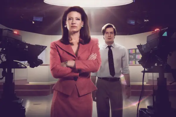 Anna Torv and Sam Reid in The Newsreader standing on set