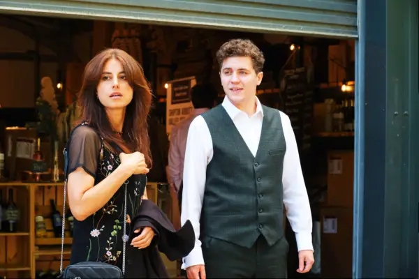 Dylan Llewellyn as PC Kelby Hartford standing slight behind Zahra Ahmadi as DS Esther Williams, to the right of her