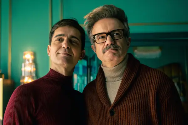 Berlin and Damian in their heist hideout