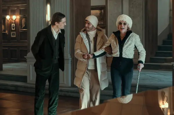 Aras Aydın (centre) with Christine Baranski and Lucas Englander in Nine Perfect Strangers