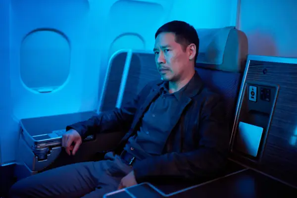 Toni Zhang sat down at the back of the plane