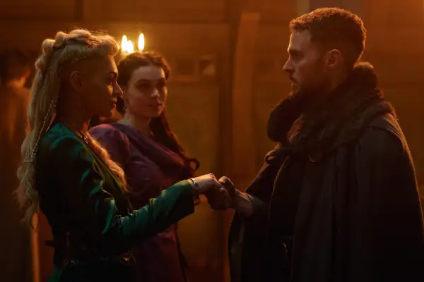 Iain De Caestecker as Arthur, Jordan Alexandra as Guinevere and Emily John as Ceinwyn in The Winter King