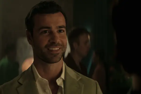 Ben Starr as Niko Lenadros in episode 406 of You