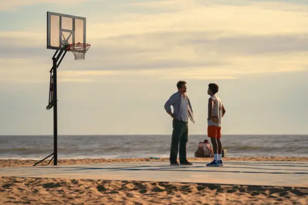 Jaden Michael as Mickey Bolitar and Kristoffer Polaha as Brad playing basketball in Harlan Coben