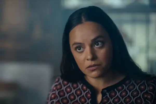 Aysha Kala as Sonya Singh in Criminal Record wearing a red and black outfit