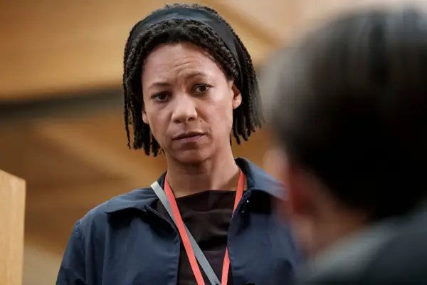 Nina Sosanya plays Jess in Killing Eve, wearing a navy shirt