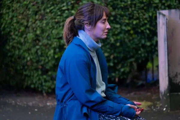 Morven Christie stars in Payback, sitting down, looking sad