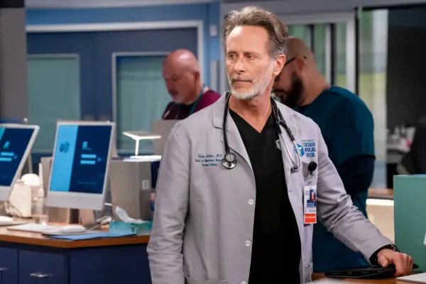Steven Weber as Dean Archer, standing in the hospital wearing his uniform