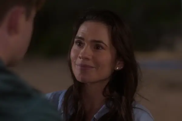 Hayley Atwell as Diane in Heartstopper season 3 speaking to Kit Connor and looking sympathetic.