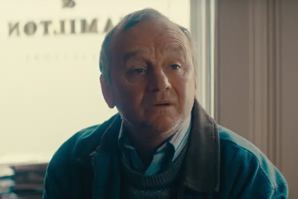 Paddy Jenkins as Happy Kelly in Blue Lights, looking offscreen