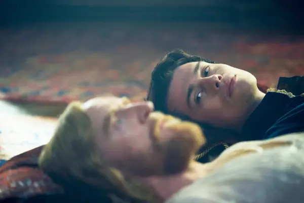 George lying on the floor next to King James